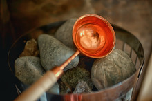 Sauna Stones / Hot Stones For Water Supply, Steam On The Stones In The Sauna, Spa Concept, Hot Relaxation