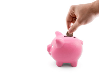 Poster - Putting coin into the piggy bank on white background 