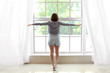 © Pixel-Shot - Morning of beautiful young woman near window