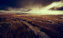 The Stone Path Winding It's Way Through Blea Moor To The Summit Of Whernside In The Yorkshire Dales.