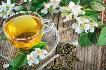 Cup of green tea with jasmine