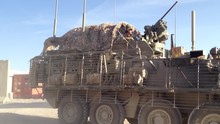 Army Stryker Rolls In From A Convoy With A Mine Roller Attached To The Front In Kandahar, Afghanistan.