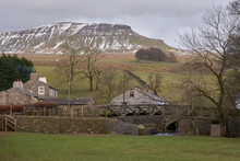 Views Of Pen-y-ghent With Winter Snow With Horton In Ribblesdale In The Foreground.