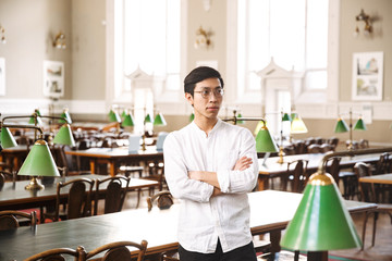 Poster - Confident asian man student standing