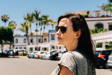 Wall Mural - Young woman wearing sunglasses on holidays in Canary Island, Gran Canaria, Spain.