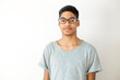 © Oleksandr - Portrait of a student with glasses afro American young man. Male mixed race black.