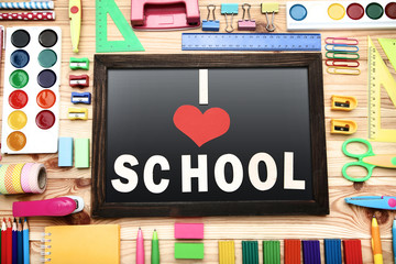 Wall Mural - Inscription I Love School with school supplies on wooden table