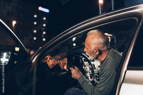 Interior Car Detailing Senior Beard Man Cleaning His Car In The Evening At Car Wash Station Buy This Stock Photo And Explore Similar Images At Adobe Stock Adobe Stock