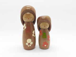 Artistic Beautiful Antique Cultural Traditional Japanese Wooden Children Toys Statue for Interior Decoration and Education Purpose in White Isolated Background