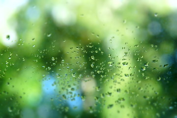 Canvas Print - rain water drops on window background closeup