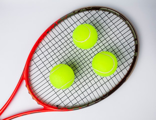 tennis racket and ball isolated on white background