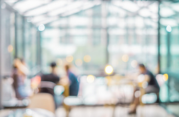 Sticker - Blurred background of customer sitting in coffee shop or cafe restaurant with bokeh light.