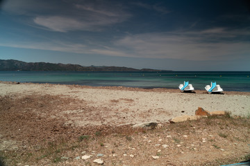 Pedalos on the beach, in Corsica