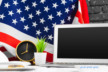 4th of July American Independence Day USA flags decorations in office desk with computer