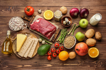 Canvas Print - Different healthy food on wooden table