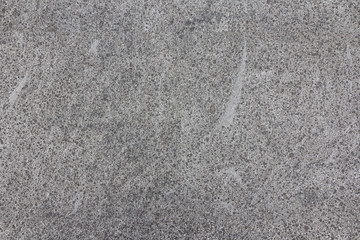 Sanded cement background. Smooth concrete surface. Polished grey stone texture.