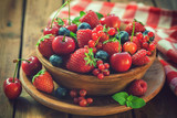 Fototapeta Mapy - Fresh mixed berry fruits in wooden bowl