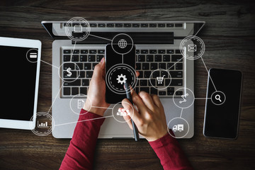 Coding software developer work with augmented reality dashboard computer icons  with responsive cybersecurity.