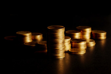 Stack of Gold Coin on Black Background.