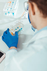 top view of different test tubes with liquid