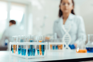 Wall Mural - selective focus of test tubes with vaccine samples
