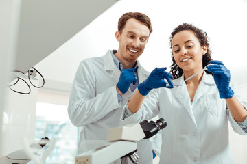 Wall Mural - happy positive biologists conducting a successful research