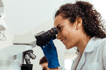Wall Mural - low angle of a positive female biologist