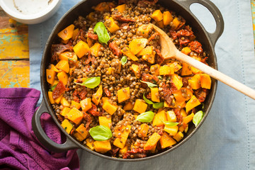 Wall Mural - Pumpkin with lentils, sun dried tomatoes and basil 