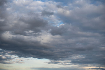 Wall Mural - white cirrocumulus clouds close the blue sky