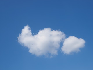 cloudy sky background, view of fat white clouds moving in blue sky background.