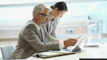 Wall Mural - Corporate coworkers discussing business in office