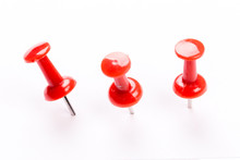 Push Red Pins Isolated On White Background.