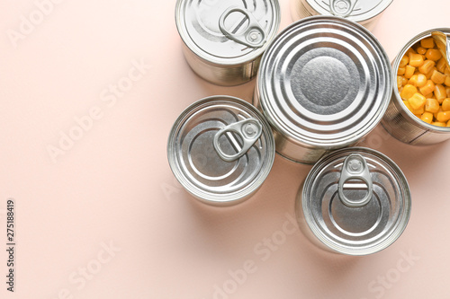 Cuadros en Lienzo Tin cans with food on light background