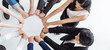 © paulaphoto - Creative team meeting hands synergy brainstorm business man woman in circle top view on white background. Support teamwork acquisition together international diversity harmony people concept banner