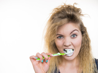 Wall Mural - Woman brushing cleaning teeth