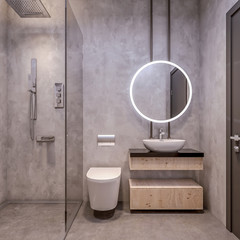 modern interior design of bathroom vanity, all walls made of stone slabs with circle mirrors, minima