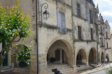 Wall Mural - street in old town with covered arches