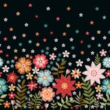 Floral embroidery. Seamless pattern with beautiful flowers on black background. Fashion design.