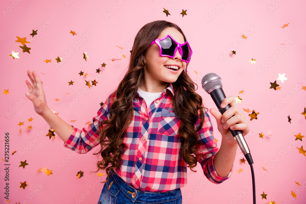 Close up photo of cool attractive crazy lady kid have fun visit event future musician loud voice solo hold hand free time stylish checked shirt isolated over pink background long haircut hairdo - obrazy, fototapety, plakaty 
