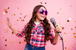 © deagreez - Close up photo of cool attractive crazy lady kid have fun visit event future musician loud voice solo hold hand free time stylish checked shirt isolated over pink background long haircut hairdo