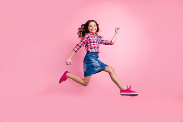 Full length body size view photo cool optimistic child funny funky careless holiday summer travel free time weekend activity move motion excited modern jeans clothes isolated pink sneakers background