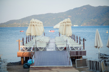 table and chairs on the beach