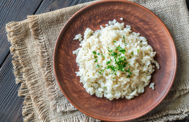 Poster - Portion of risotto on the wooden table