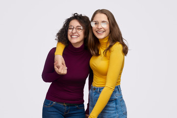 Wall Mural - carefree best friends looking at camera