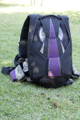 Parachute backpack on grass