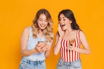 Poster - Two cheerful young girls wearing summer outfit