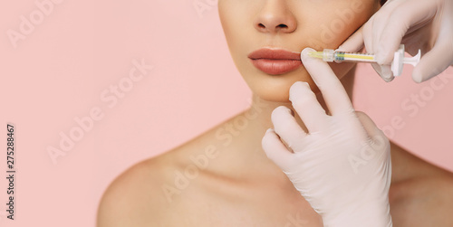 Fényképezés  woman's plumper lips, getting bigger lips