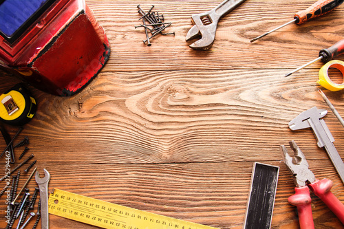 Fotomural tools male workplace background texture dark wood