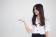 © tiniroma - Portrait of thai adult student university uniform beautiful girl show hand