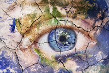 Earth Extinction Concept. Close Up Image Of Woman Face With Earth Painted, Cracked Texture With Iris Earth. Creative Composite Of Macro Eye With Earth As Iris. Elements Of This Image Furnished By NASA